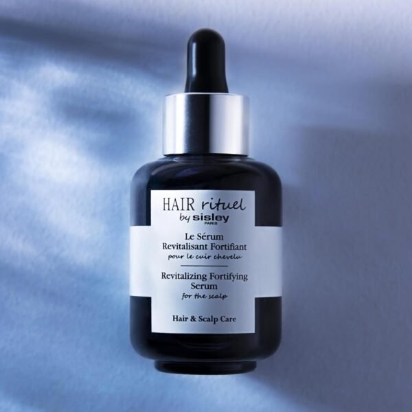 Sisley Paris Hair Rituel Revitalizing Fortifying Serum - 60 mL - Visibly Fortifies the Hair & Scalp - Ultra-Light, Non-Greasy Texture - Ideal for Scalp Massage - Image 5